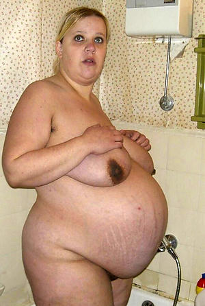 Gorgeous mature pregnant undress photo