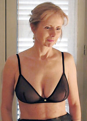 Sexy mature woman wearing bra morose pics